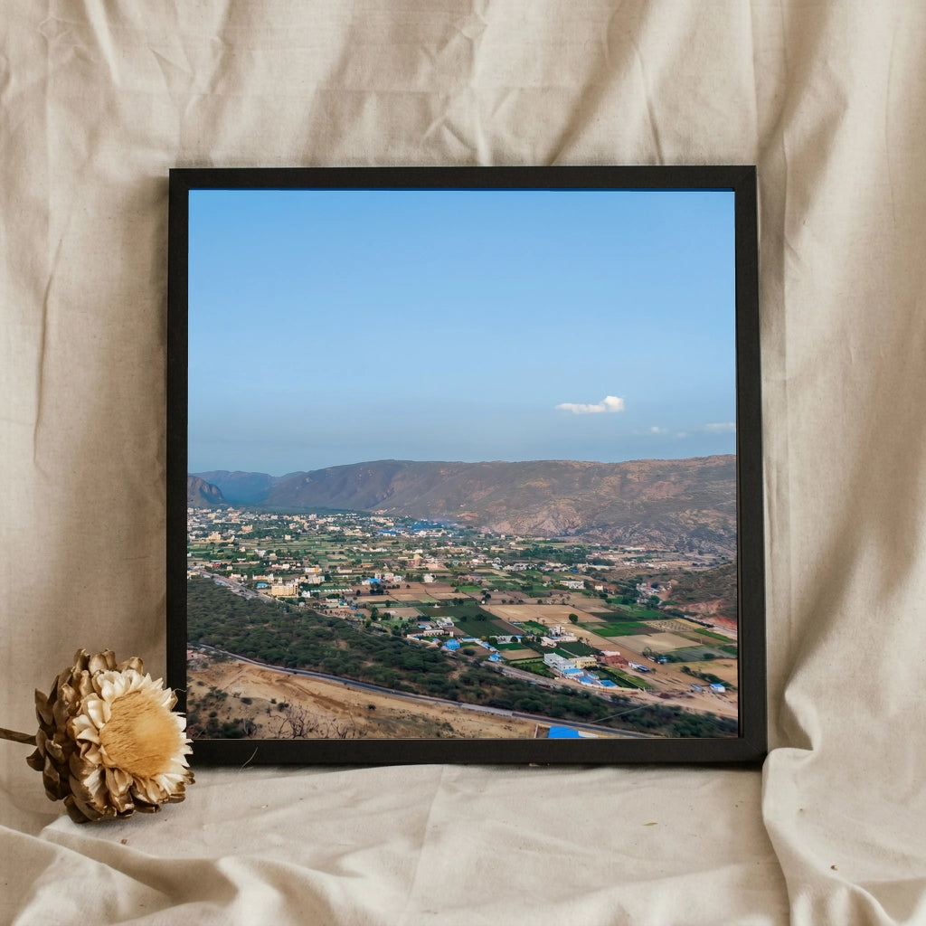 Hilltop View Over a Golden Valley Town