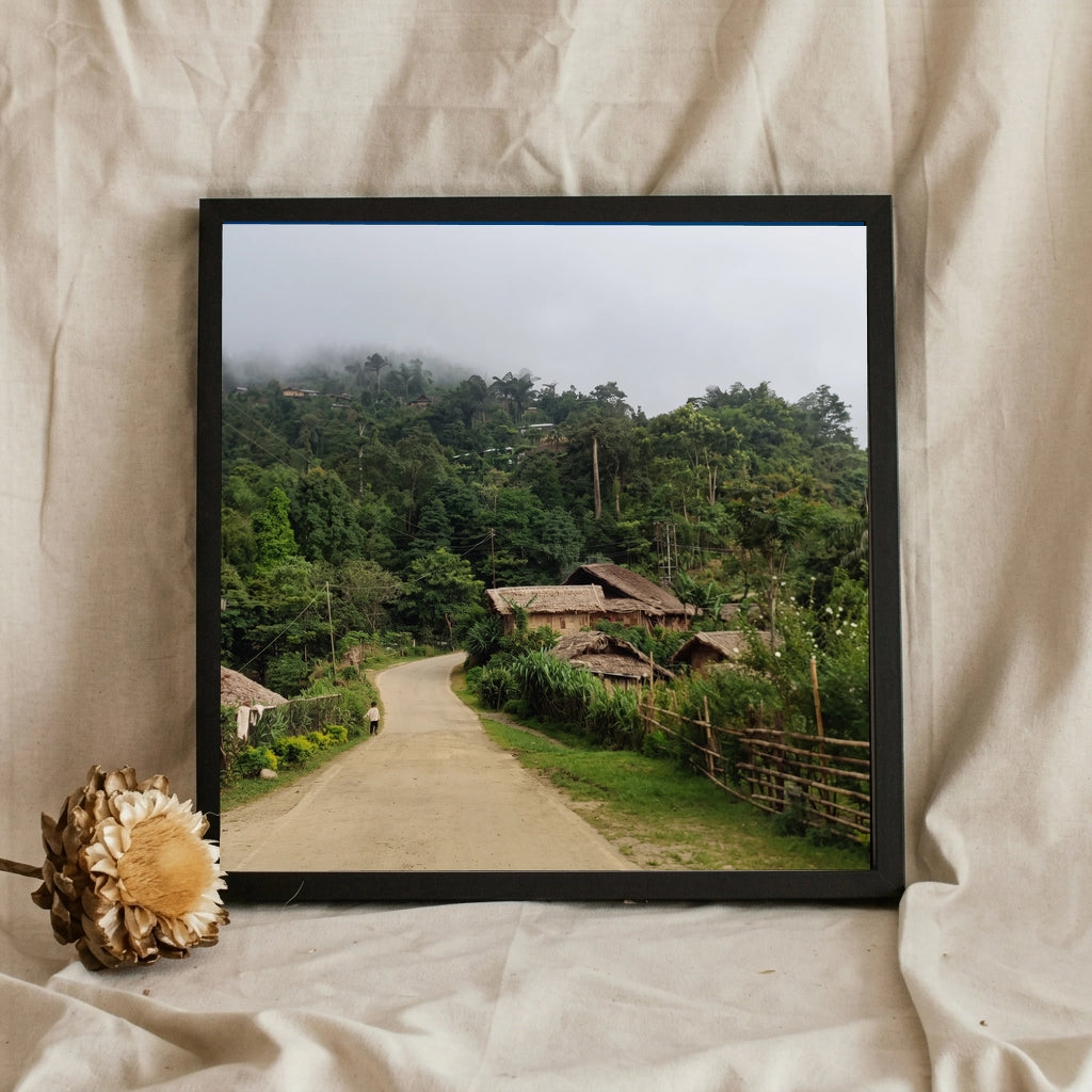 Misty Hill Village with Thatched Huts