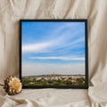 Big Sky Over a Hilltop Town