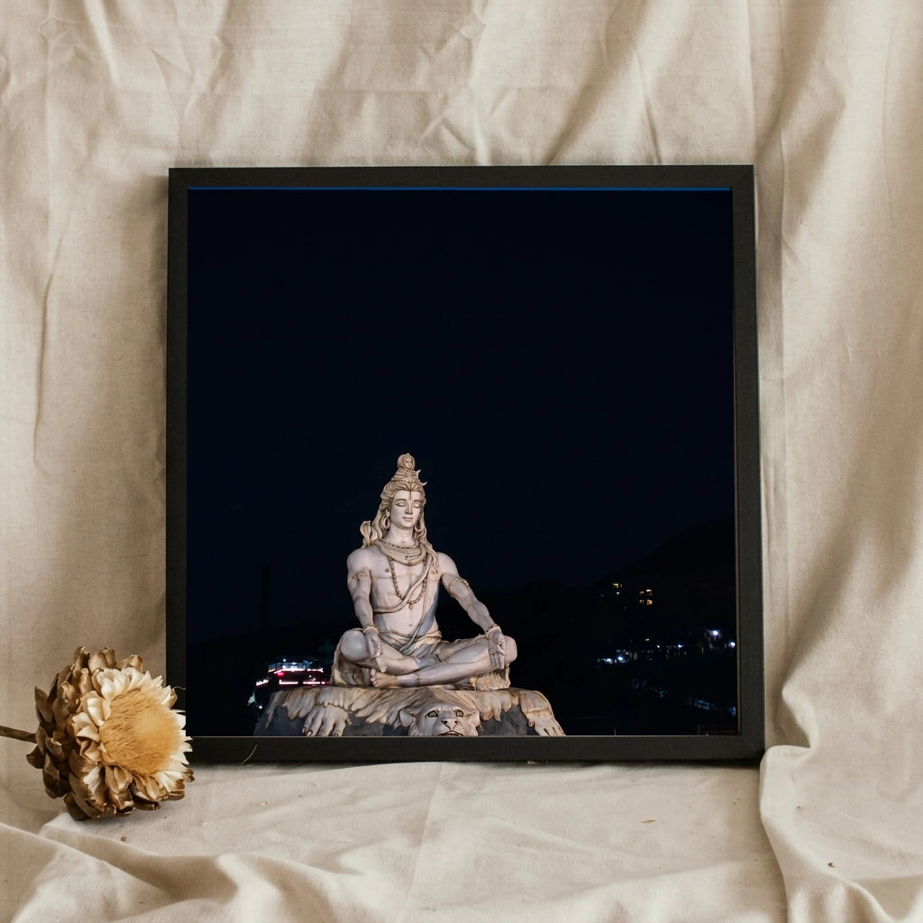 Shiva Statue Lit at Night
