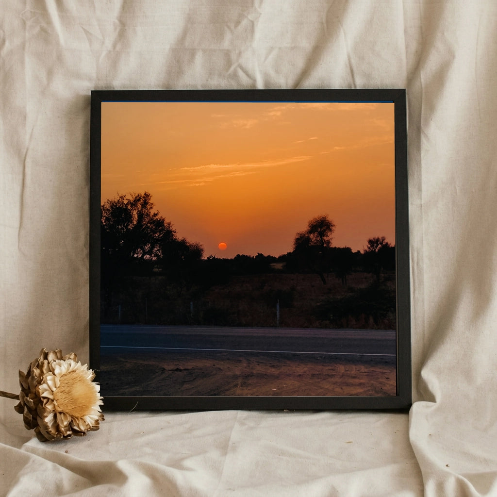 Orange Sunset Over a Rural Road