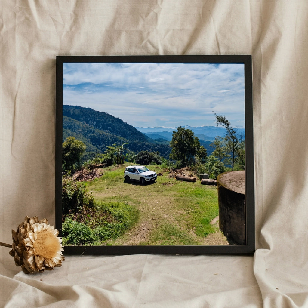 White SUV on a Mountain Overlook